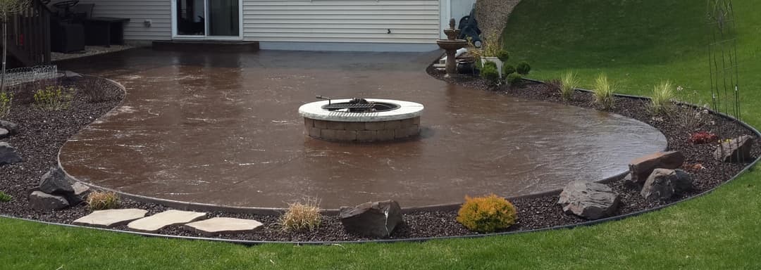 picture of brown  textured concrete backyard deck