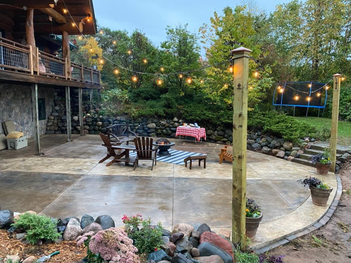 picture of a textured beige concrete backyard patio  